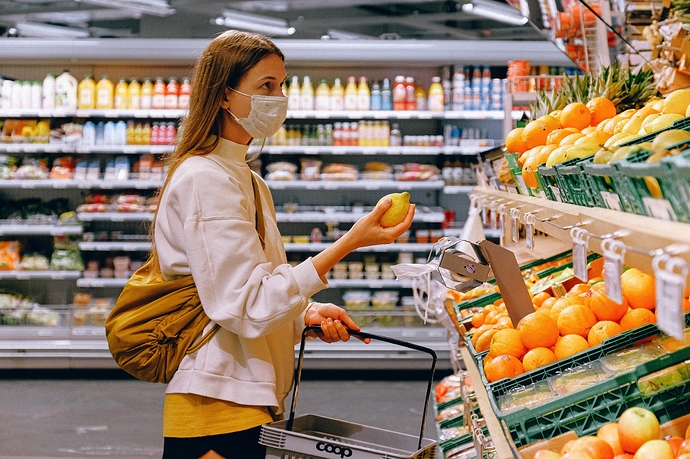 woman-in-yellow-tshirt-and-beige-jacket-holding-a-fruit-3962285_resized